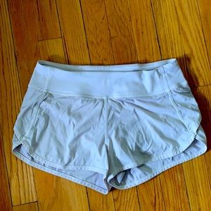 Gently worn white Ivivva shorts